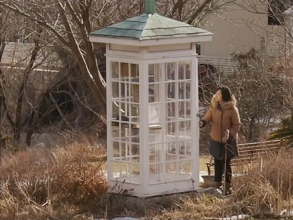 A Phone Booth and a Disconnected Phone